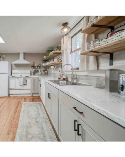 Black metal Auburn Z Open Shelf Support brackets holding natural wood shelves with white dishes in modern farmhouse kitche...