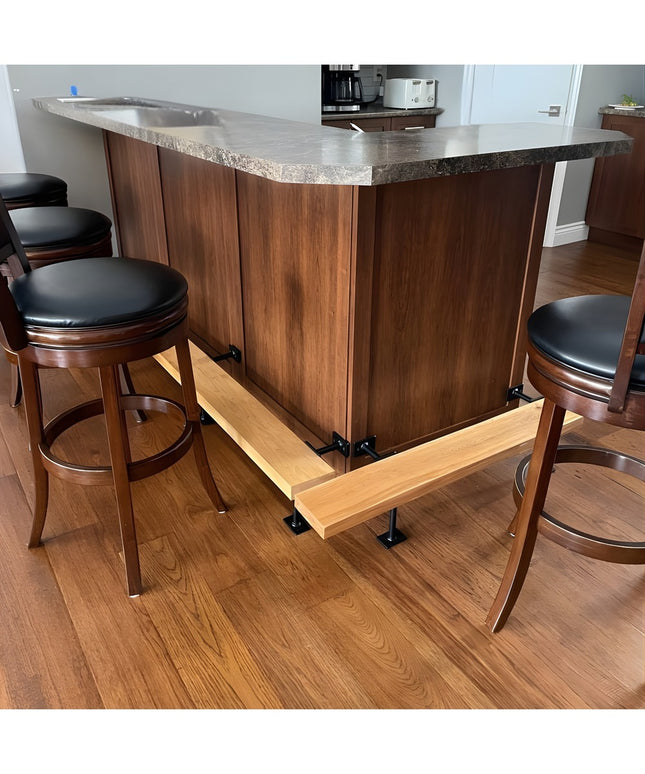 Black metal bar foot rail brackets supporting wooden foot rest under walnut kitchen island with bar stools - Industrial Fa...