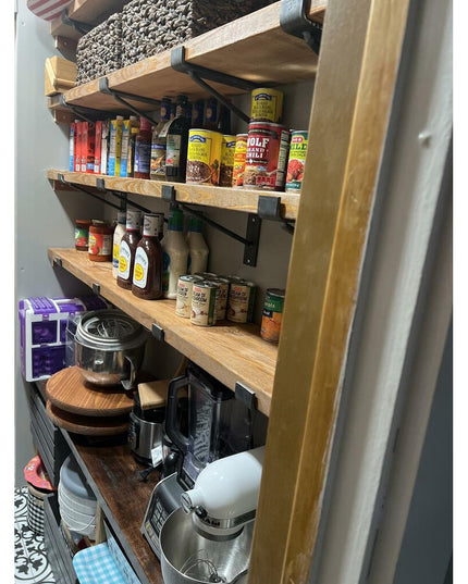 Industrial Farm Co Nauseef black metal shelf support brackets holding wooden pantry shelves with canned goods and kitchen ...
