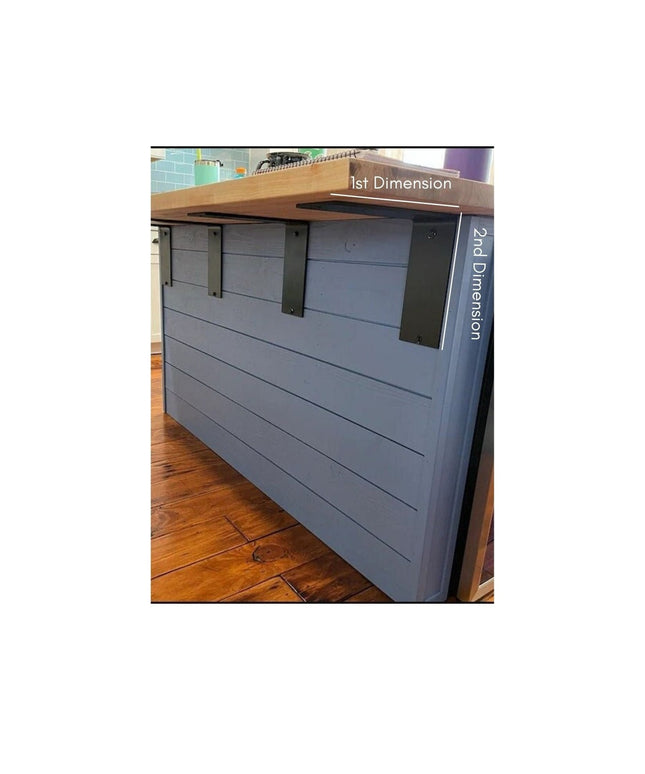 Gray kitchen island with black metal Lorraine L shelf brackets supporting wooden countertop, showing heavy duty steel supp...