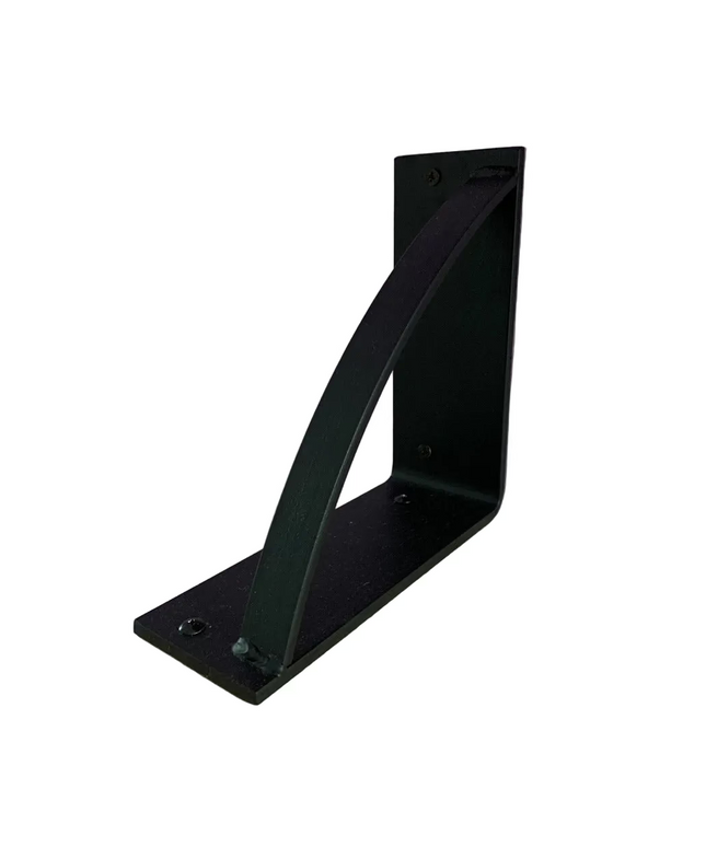 Black metal triangle shelf bracket "The Brie Bookshelf Bracket" by Industrial Farm Co mounted on natural wood against purp...