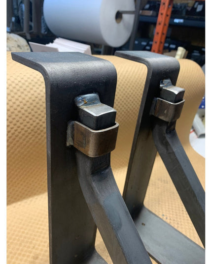 Industrial Farm Co Bison 3" mantel brackets with black steel square support bars and metal straps mounted on light wood beam