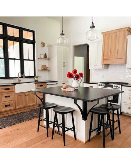 Black metal Syracuse countertop support brackets holding dark kitchen island top with bar stools in modern farmhouse kitch...