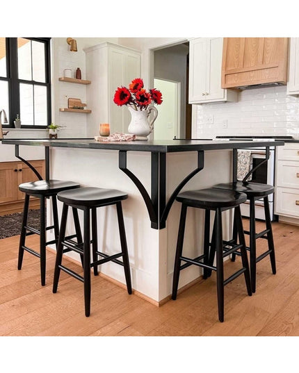 Black metal Syracuse countertop support brackets from Industrial Farm Co holding up dark countertop with black bar stools ...