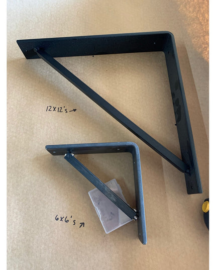 Black metal Oneida Shelf Brackets by Industrial Farm Co in two sizes - large 12x12 inch and small 6x6 inch triangular wall...