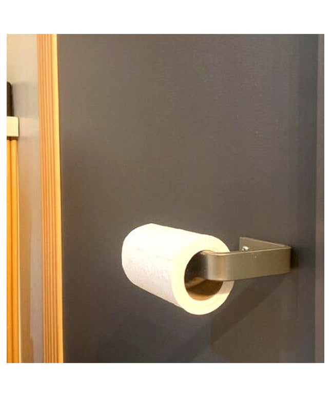 Manlius minimalist stainless steel toilet paper holder mounted on gray bathroom wall with white toilet paper roll by Indus...