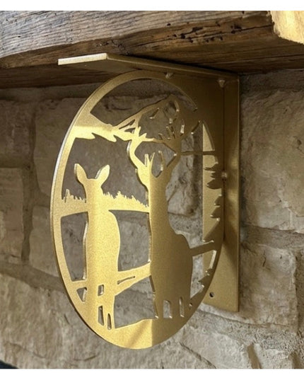 Industrial Farm Co handcrafted golden metal deer landscape L-bracket shelf support mounted on rustic stone wall with woode...