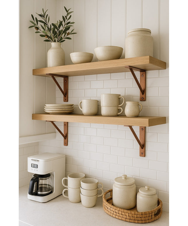 Middletown L Shelf Support brackets in copper finish holding natural wood shelves with beige ceramic dishes and mugs in mo...