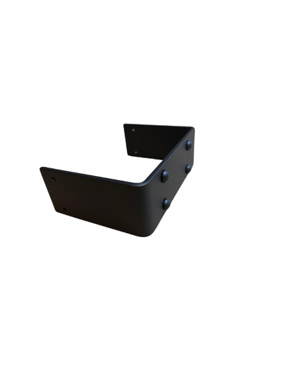 Steel beam wrap featuring evenly spaced rivets welded into place. The wrap is designed to encase and reinforce structural beams, with a smooth, polished surface interrupted by the raised heads of the rivets. The rivets add both structural integrity and a rugged, industrial aesthetic to the beam
