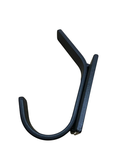 Black metal Elizabeth Wall Hook by Industrial Farm Co with curved design and mounting bracket against white background
