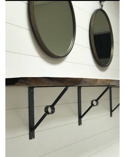 Industrial Farm Co Glen Cove Modern black metal shelf brackets with circular detail supporting wood shelf, with round mirr...