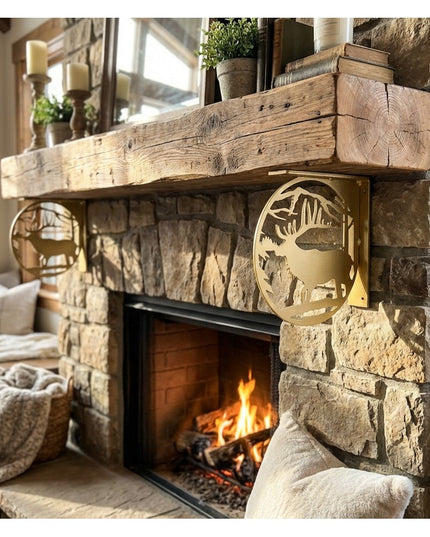 Handcrafted gold metal elk profile L-bracket shelf support mounted on rustic stone fireplace with reclaimed wood mantel by...