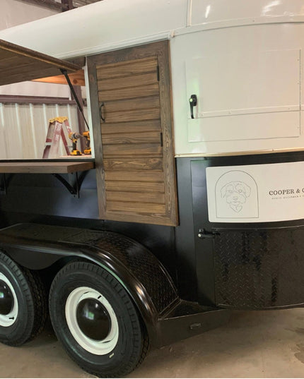 Custom travel trailer featuring Industrial Farm Co Cortland 3" black metal shelf brackets with rivets supporting wood shel...