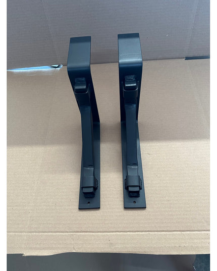 Two black heavy duty steel mantel brackets with square support bars and metal straps by Industrial Farm Co, handmade in USA