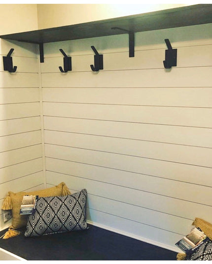 The Elizabeth Wall Hook by Industrial Farm Co - black metal coat hooks mounted on dark wood shelf above white shiplap wall...