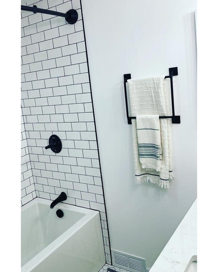 The Parker Hand Towel Holder by Industrial Farm Co - black metal decorative towel ladder mounted on white bathroom wall ho...