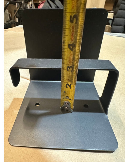 Black powder-coated steel Cazenovia toilet paper holder with shelf by Industrial Farm Co, measuring tape showing height di...