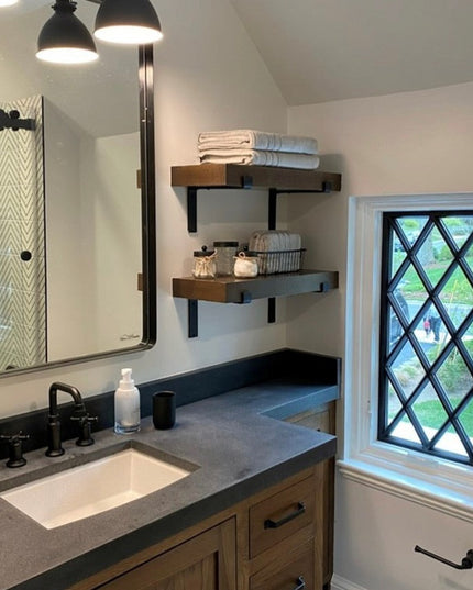 Auburn Z Open Shelf Support by Industrial Farm Co - black metal brackets holding wooden floating shelves in modern bathroo...