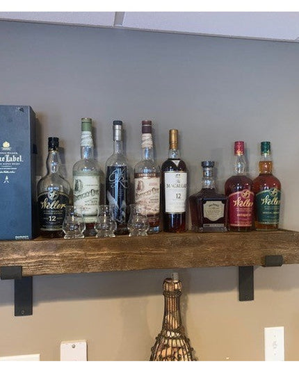 Industrial Farm Co Auburn Z Open Shelf Support brackets in black metal holding rustic wood floating shelf displaying whisk...