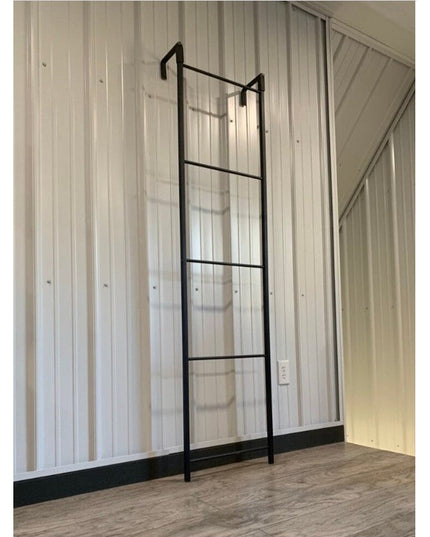 The Hal Standing Mounted black metal blanket ladder by Industrial Farm Co mounted on white shiplap wall in modern farmhous...