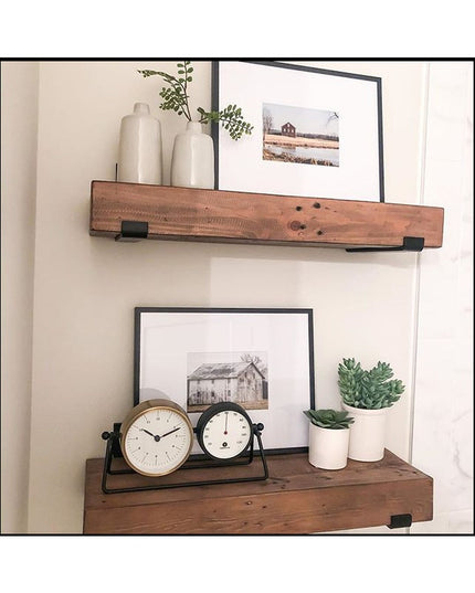 Black metal Jane J Style Shelf Brackets by Industrial Farm Co supporting rustic wood floating shelves with farmhouse decor...