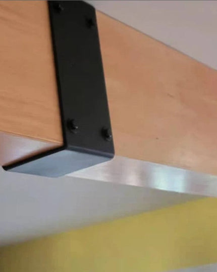 Santa Fe Beam Wrap by Industrial Farm Co showing black metal bracket supporting natural wood beam against ceiling with yel...