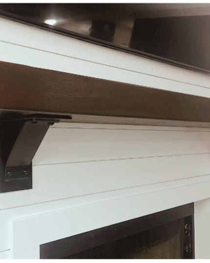 Black metal Ithaca Rustic Bracket Support by Industrial Farm Co mounted on white shiplap wall supporting wooden shelf