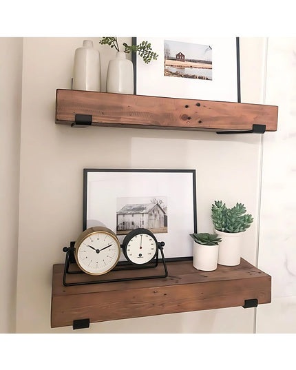 Industrial Farm Co Jane J Style black metal shelf brackets supporting rustic wood floating shelves with home decor and plants
