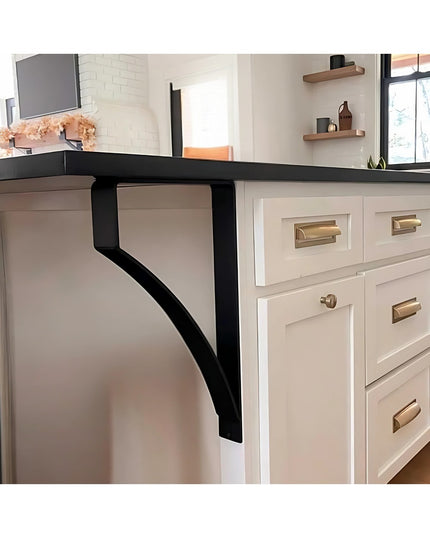 Black metal Syracuse countertop support brackets by Industrial Farm Co supporting dark countertop over white kitchen cabin...