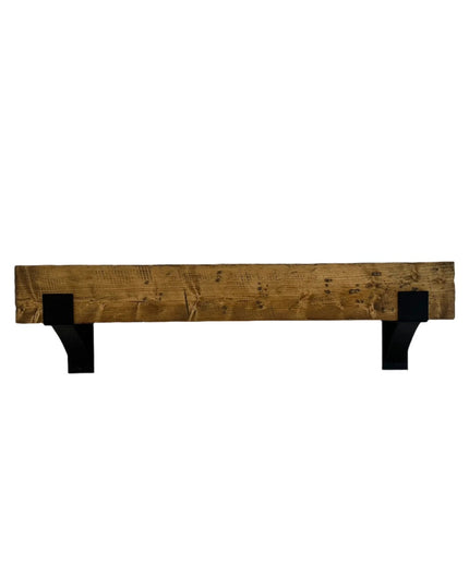 Rustic wooden mantel shelf with black steel bracket supports from Industrial Farm Co, showing natural wood grain and weath...