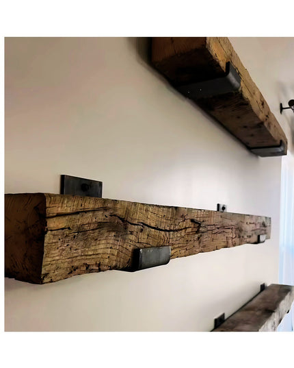 Rustic weathered wood floating shelves mounted on white wall with black metal Industrial Farm Co Glimmerglass J brackets