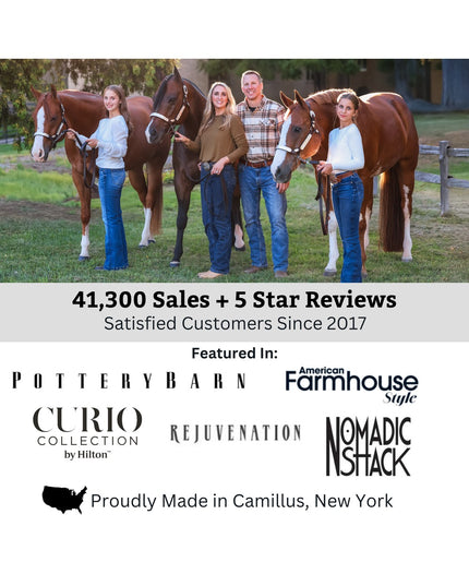 Family of four people standing with three brown horses on grass field, showcasing Industrial Farm Co's handcrafted product...