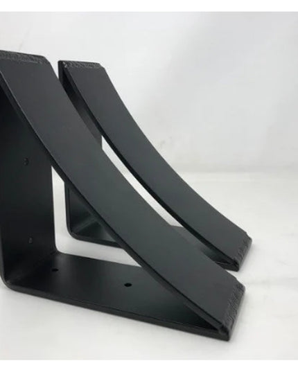Black steel Eleanor Minimal Steel Bracket pair by Industrial Farm Co, modern triangular wall mount brackets with clean geo...
