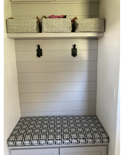Black industrial wall hooks mounted on white shiplap wall above built-in bench with storage baskets - The Elizabeth Wall H...