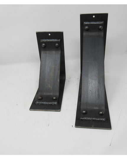 Two black metal Ithaca Rustic Bracket Supports by Industrial Farm Co with welded construction and mounting holes, displaye...