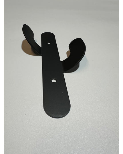Black metal Sedona Cactus Wall Hook by Industrial Farm Co with curved arms and mounting holes on white background