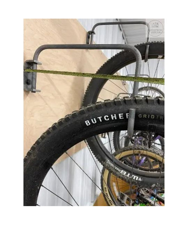 The Logan Wall Mounted Bike Rack Hook Fat Bike Rim Finish Copper Powder Coat | Industrial Farm Co
